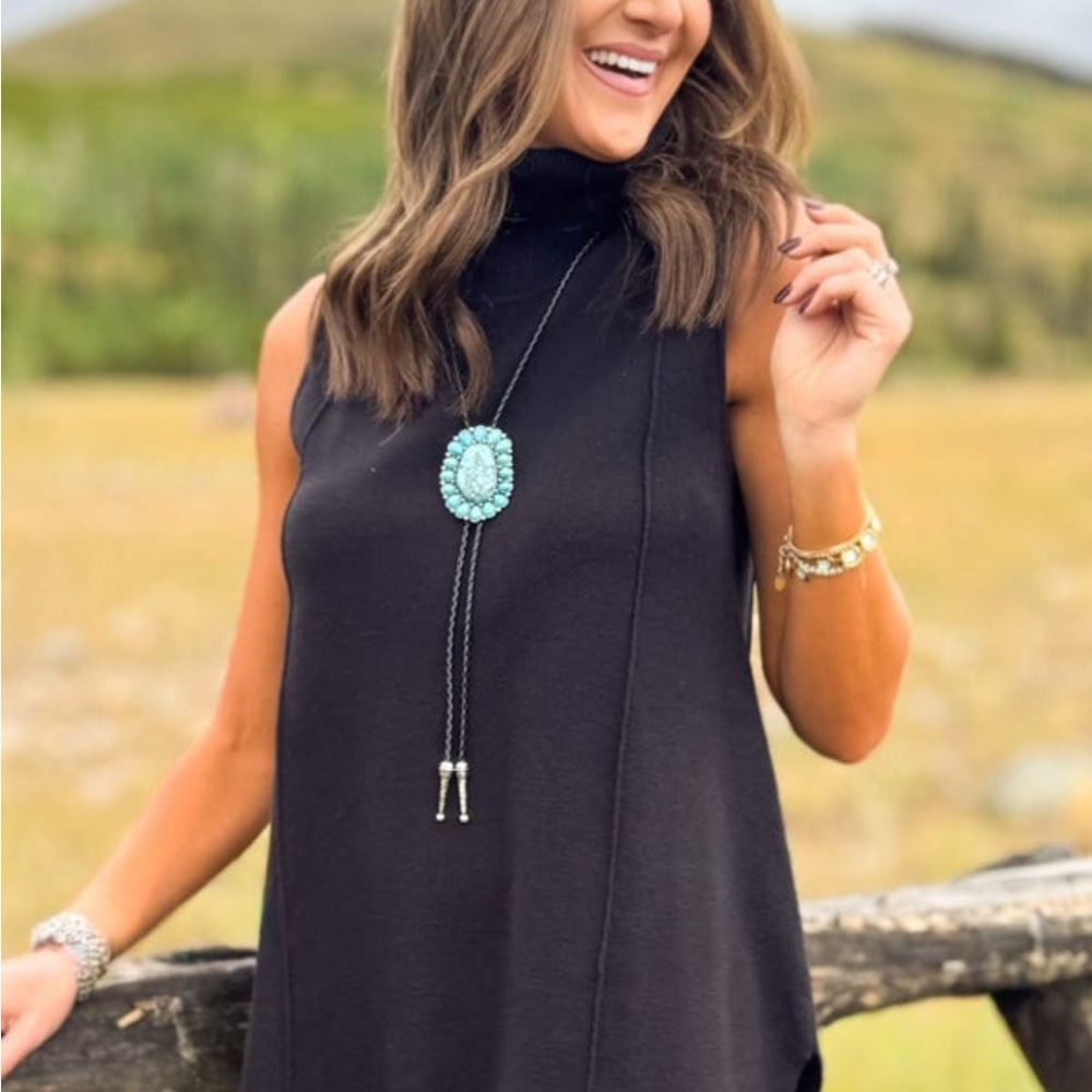 Black Sleeveless Turtleneck Top